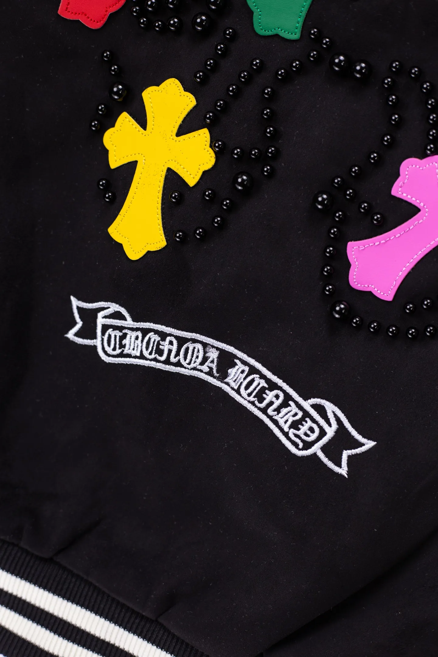 P340 Chrome Hearts heavy industry full pearl Sanskrit pattern baseball jacket jacket OS version can be worn by both men and women!  High thread count suede and cotton fabric! The texture is clear and smooth, not easy to wrinkle or fade!  The embroidery process is complex and repetitive. It takes 4 repeated embroideries to complete all the embroidery. ✅The requirements for the embroidery machine are very strict. We used an imported Tajima embroidery machine for the operation. Such small letters are so clear. We make clothes with care, and every detail must be restored one to one!  The hardware is all carved and cast, and they are all genuine from the original factory!  This piece of clothing consumes a lot of material, with more than 2 meters of material used for one piece of clothing! After the garment is made, it needs to be fixed at high temperature, washed at a water temperature of more than 70 degrees, and softened by adding softener to make the upper body softer and smoother!  The workmanship is extremely complex and can be called a handicraft!  Color: black